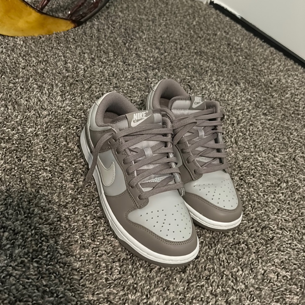 Tan and grey Nikes